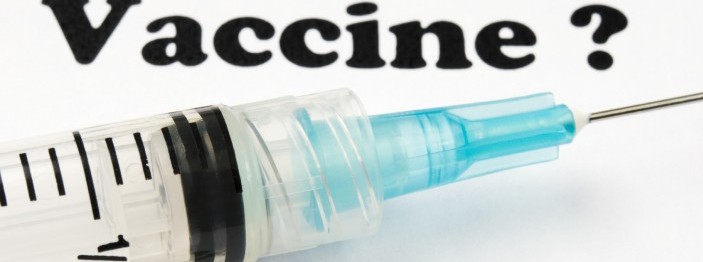 Syringe in front of the word "Vaccine?"