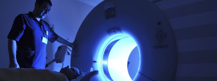 Male doctor giving an MRI to a patient